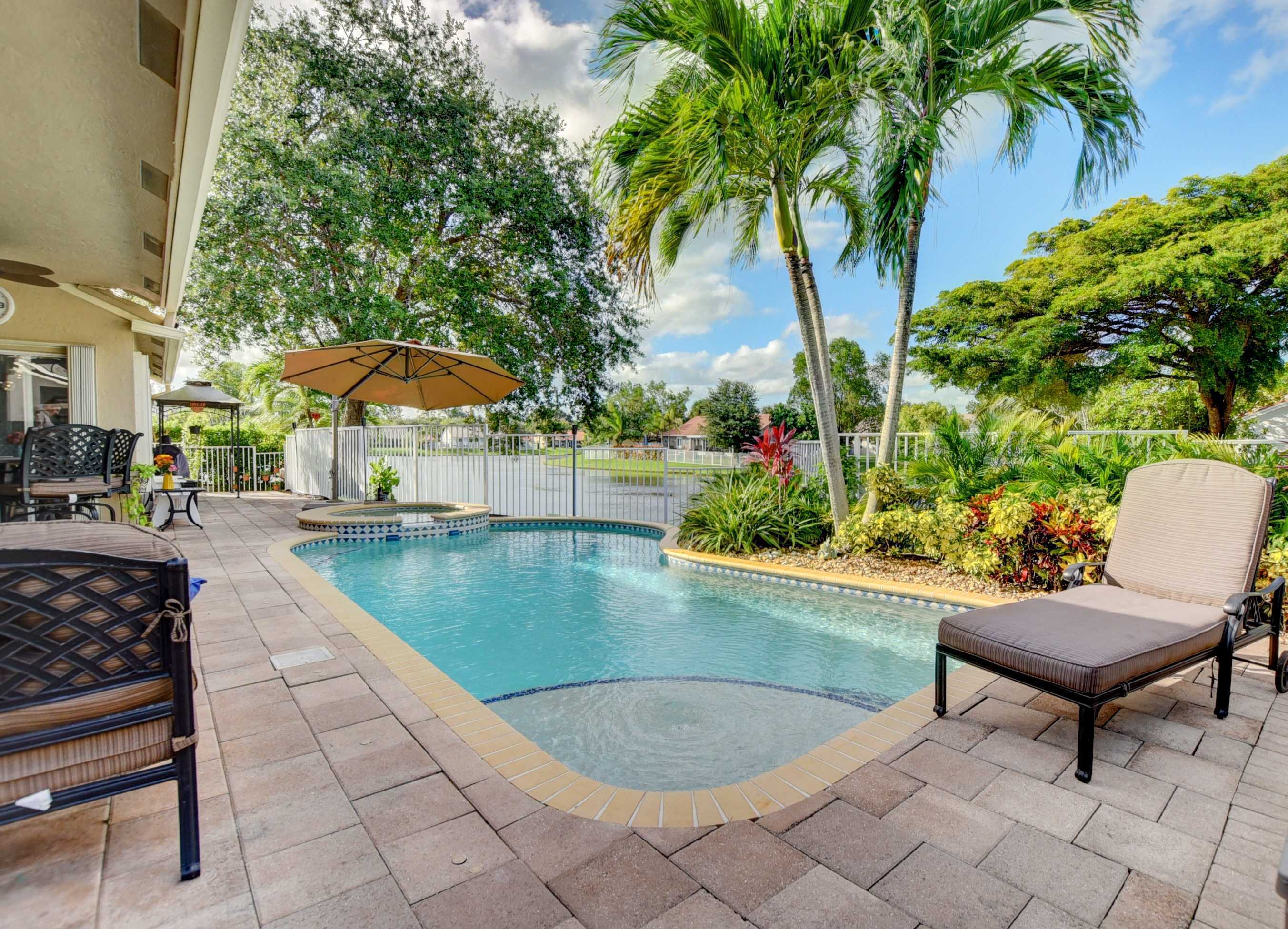 Single Family Pool Home in Coconut Creek FL